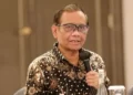 Menteri Koordinator Bidang Politik, Hukum, dan Keamanan, Mahfud MD, Menegaskan Pentingnya Dukungan Terhadap Pengungkapan Kasus Pencucian Uang di Indonesia